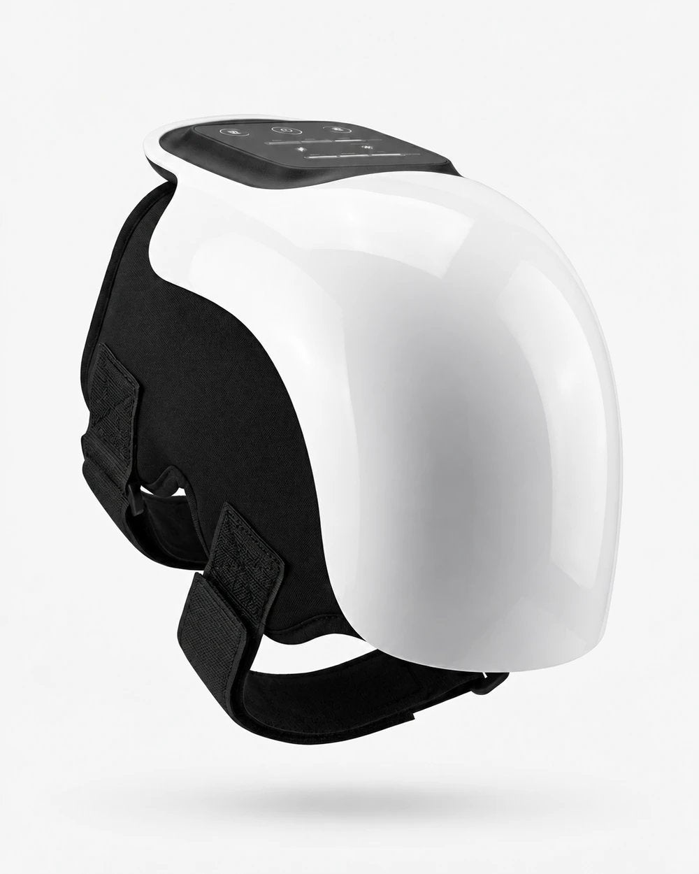 Knee massager with heat – white device with black straps