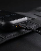 Cordless heated massage belt – close-up of the charging port