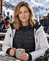 Unisex heated vest PyreFit Aurina on a winter day: skiing