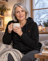 Women's heated zip sweatshirt PyreFit Cosaro on a winter day: at home