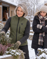 Women's heated vest PyreFit Mellora on a winter day: in the barn or garden