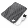 Coussin chauffant électrique PyreFit gris avec régulateur sur le câble