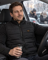 Unisex heated puffer vest PyreFit Pivotan on a winter day: in the car