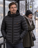 Men's heated puffer jacket PyreFit Rangor on a winter day: in the rain