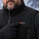Veste chauffante sans manches unisexe à largeur ajustable PyreFit Tarnor, gros plan sur le bouton de commande