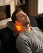 Contoured heated neck pillow – man with the pillow behind his neck