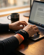 LED red light wrist band – band worn while working on a laptop