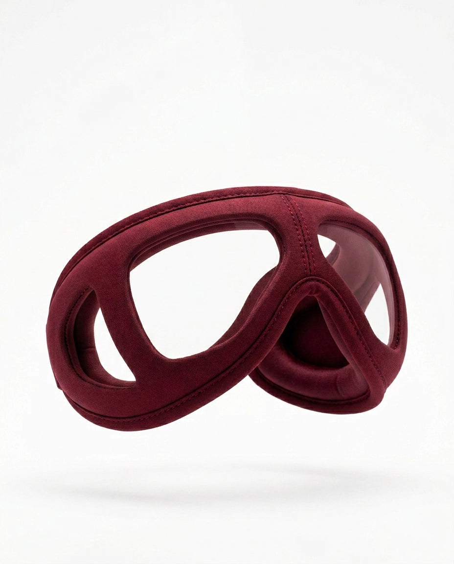 Glasses-style eye massager – red glasses-shaped device