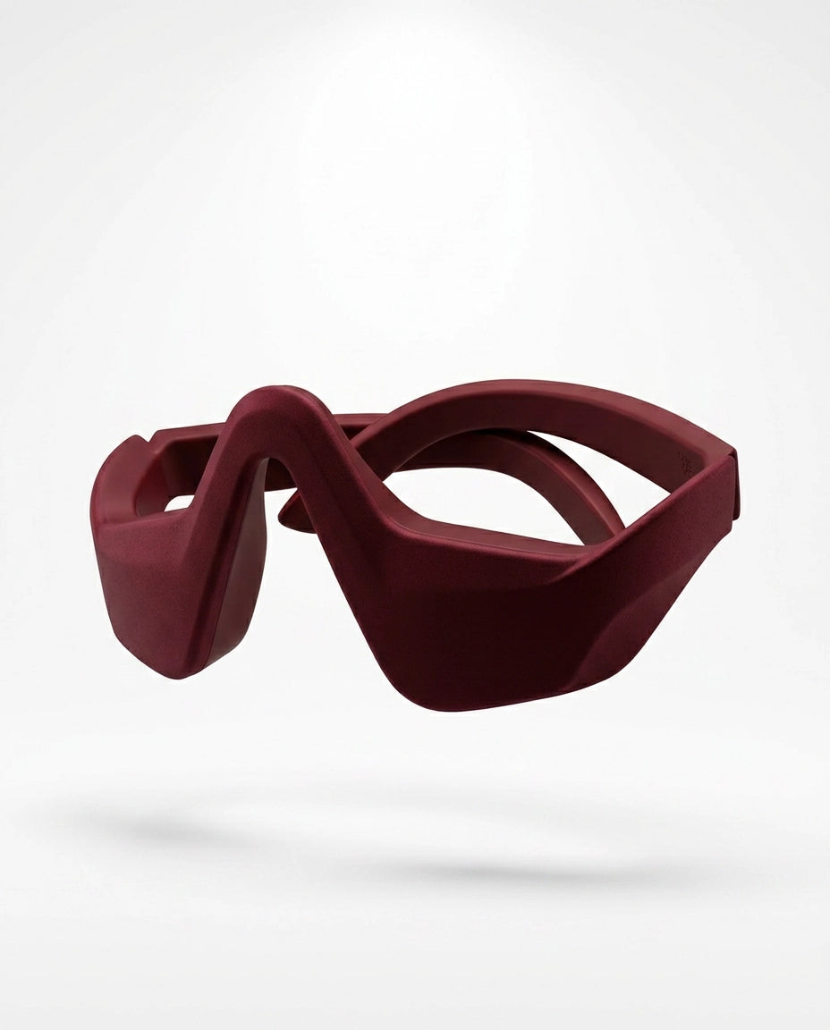 Glasses-style eye massager – red colour variant from the front