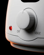 Massage oil warmer with display – close-up of the dial